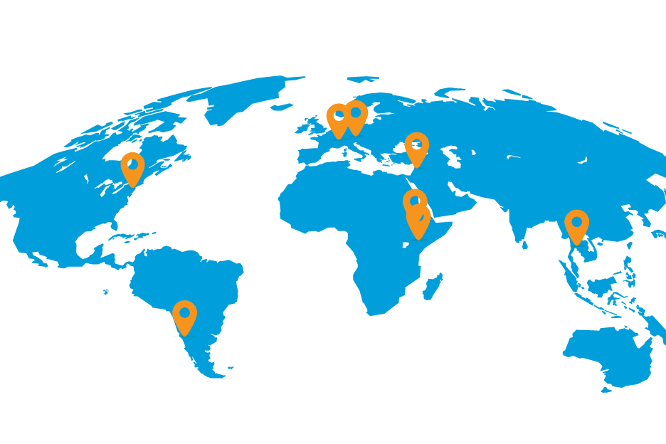 A blue world map with seven orange location pins to locate Language Programmes at the United Nations: New York, HQ, Geneva, Vienna, Beirut/ESCWA, Santiago/ECLAC, Nairobi, Addis Ababa and Bangkok